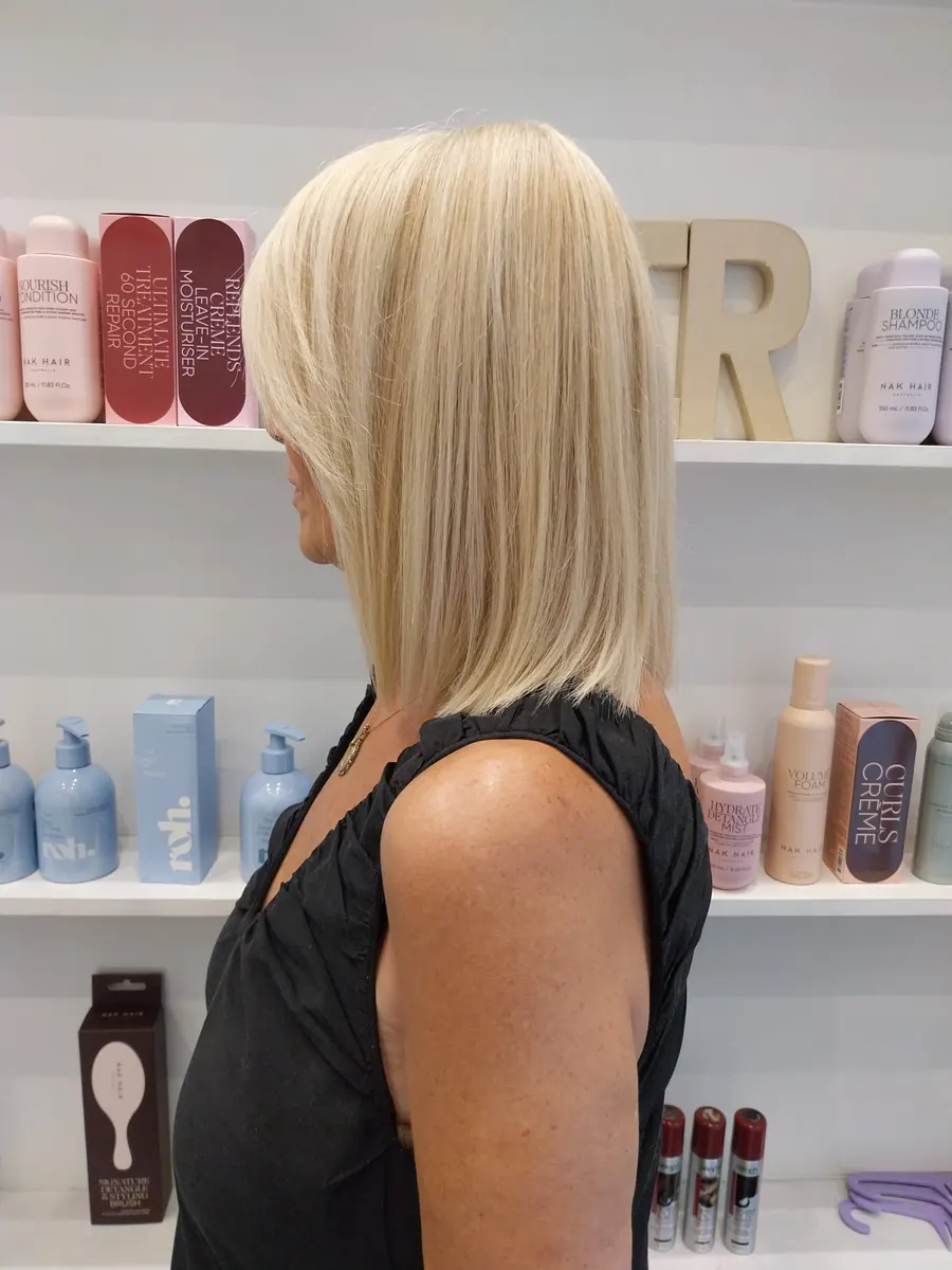 Media melena rubia lisa en Tandem Hair